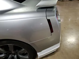 2009 Nissan GT-R Premium с VIN JN1AR54F89M252013, выставлен на аукционе Copart как лот 70656764 с пробегом 66 085 миль миль и Списание • Salvage title. История ставок и продаж доступна на DreamBid. Изображение 12.