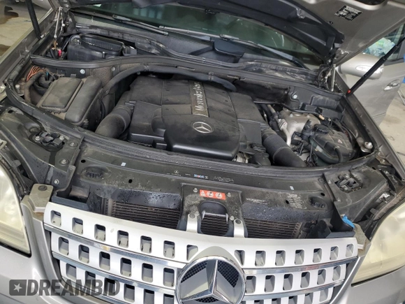 2006 Mercedes-Benz M 500 z VIN 4JGBB75EX6A043551, wystawiony jako Copart lot #55937265 z przebiegiem 120 923 mil mil oraz Szkoda całkowita • Salvage title. Historia ofert i sprzedaży dostępna na DreamBid. Obrazek 12.