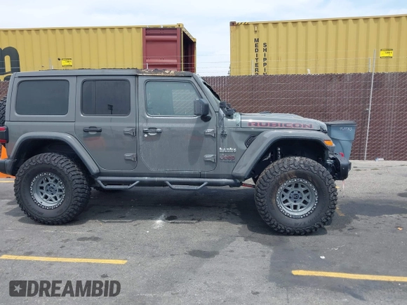 2020 Jeep Wrangler Unlimited Rubicon с VIN 1C4JJXFM4LW100382, выставлен на аукционе IAAI как лот 42338687 с пробегом Не указан миль и . История ставок и продаж доступна на DreamBid. Изображение 12.