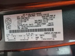 2013 Ford Escape SE с VIN 1FMCU9GX4DUA96010, выставлен на аукционе Copart как лот 57591945 с пробегом 162 760 миль миль и Списание • Salvage title. История ставок и продаж доступна на DreamBid. Изображение 14.