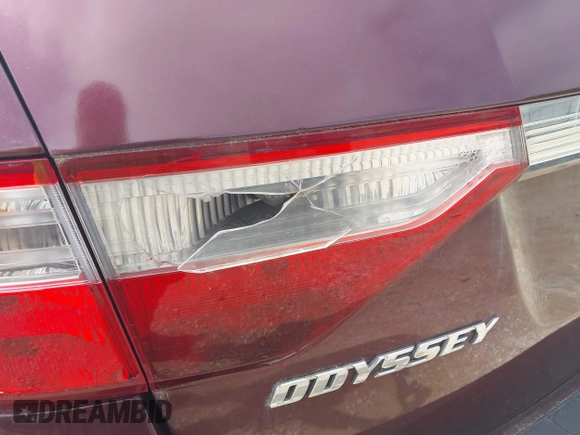 2011 Honda Odyssey EX-L with VIN 5FNRL5H6XBB096891, listed as a IAAI auction lot 42840531 with 214,842 mi miles and . Bid and sale history available at DreamBid. Image 6.