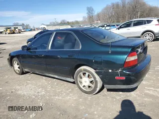 1994 Honda Accord EX w/Leather with VIN 1HGCD5562RA165567, listed as a Copart auction lot 44996755 with 239,093 mi miles and Salvage Title. Bid and sale history available at carsss.com. Image 2.