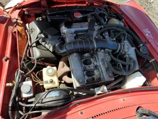 1986 Alfa Romeo Spider Veloce z VIN ZARBA5417G1036669, wystawiony jako Copart lot #83489434 z przebiegiem 71 219 mil mil oraz Czysty tytuł • Clean title. Historia ofert i sprzedaży dostępna na DreamBid. Obrazek 11.
