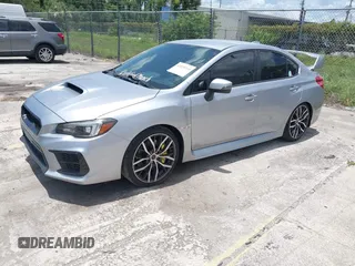 2021 Subaru WRX STI with VIN JF1VA2E66M9822014, listed as a IAAI auction lot 42499316 with 55,625 mi miles and . Bid and sale history available at DreamBid. Image 2.