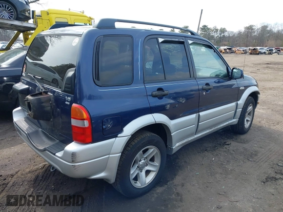 2003 Suzuki Grand Vitara z VIN JS3TD62V534105807, wystawiony jako IAAI lot #41662214 z przebiegiem 111 087 mil mil oraz . Historia ofert i sprzedaży dostępna na DreamBid. Obrazek 4.
