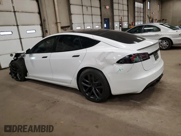 2023 Tesla Model S с VIN 5YJSA1E5XPF520265, выставлен на аукционе Copart как лот 54833255 с пробегом 16 502 миль миль и Списание • Salvage title. История ставок и продаж доступна на DreamBid. Изображение 2.