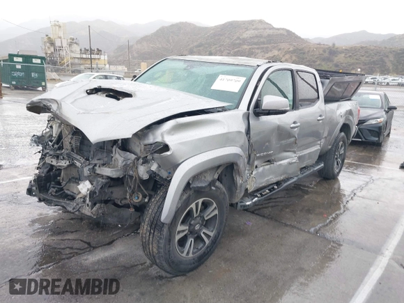 2018 Toyota Tacoma SR5 with VIN 3TMBZ5DN0JM012259, listed as a IAAI auction lot 41709709 with Not provided miles and . Bid and sale history available at DreamBid. Image 2.
