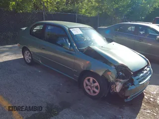 2005 Hyundai Accent GLS z VIN KMHCG35C85U325195, wystawiony jako IAAI lot #42356839 z przebiegiem 61 072 mil mil oraz . Historia ofert i sprzedaży dostępna na DreamBid. Obrazek 1.