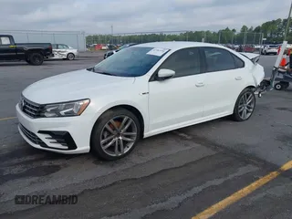 2018 Volkswagen Passat S z VIN 1VWAA7A39JC016259, wystawiony jako IAAI lot #42382550 z przebiegiem 89 143 mil mil oraz . Historia ofert i sprzedaży dostępna na DreamBid. Obrazek 2.