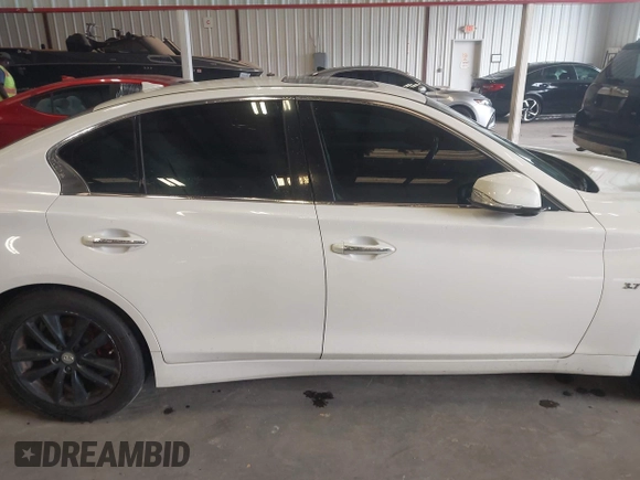 2015 Infiniti Q50 with VIN JN1BV7AP0FM347685, listed as a IAAI auction lot 42690285 with 126,957 mi miles and . Bid and sale history available at DreamBid. Image 13.