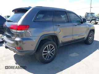 2017 Jeep Grand Cherokee Trailhawk with VIN 1C4RJFLG3HC877110, listed as a IAAI auction lot 42276506 with 144,993 mi miles and . Bid and sale history available at DreamBid. Image 4.