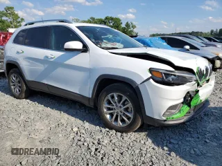 2021 Jeep Cherokee Latitude Lux with VIN 1C4PJLMXXMD224315, listed as a Copart auction lot 55253205 with 90,516 mi miles and Salvage title. Bid and sale history available at DreamBid. Image 4.