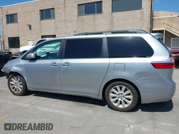 2015 Toyota Sienna XLE with VIN 5TDYK3DC5FS594514, listed as a IAAI auction lot 42183673 with 120,978 mi miles and . Bid and sale history available at DreamBid. Image 14.