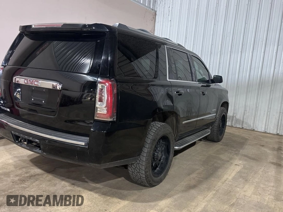 2015 GMC Yukon Denali with VIN 1GKS2CKJ6FR615557, listed as a Copart auction lot 53944465 with 150,605 mi miles and Clean Title. Bid and sale history available at carsss.com. Image 4.