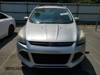 2013 Ford Escape Titanium z VIN 1FMCU0J96DUB50607, wystawiony jako Copart lot #55999745 z przebiegiem 177 798 mil mil oraz Czysty tytuł • Clean title. Historia ofert i sprzedaży dostępna na DreamBid. Obrazek 5.