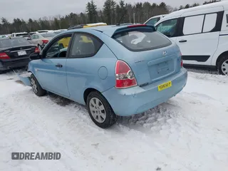 2008 Hyundai Accent GS with VIN KMHCM36C98U062601, listed as a IAAI auction lot 41565161 with 148,281 mi miles. Bid and sale history available at carsss.com. Image 3.
