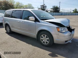 2010 Chrysler Town & Country Touring Plus with VIN 2A4RR8D18AR394752, listed as a Copart auction lot 52367295 with 157,320 mi miles and Salvage Title. Bid and sale history available at DreamBid. Image 4.