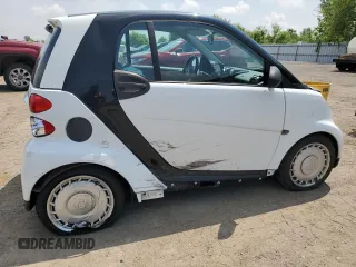 2010 Smart fortwo Pure с VIN WMEEJ3BA4AK399691, выставлен на аукционе Copart как лот 60283245 с пробегом 172 584 миль миль и Чистый • Clean title. История ставок и продаж доступна на DreamBid. Изображение 3.