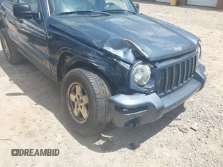2002 Jeep Liberty Limited z VIN 1J8GL58K32W156681, wystawiony jako IAAI lot #42209101 z przebiegiem 158 743 mil mil oraz . Historia ofert i sprzedaży dostępna na DreamBid. Obrazek 6.