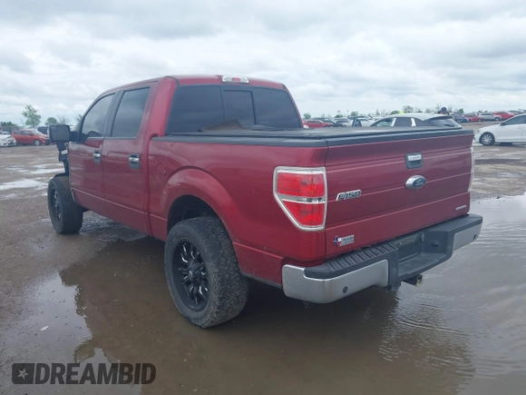 2014 Ford F-150 XL with VIN 1FTFW1CF2EKF21358, listed as a IAAI auction lot 41898227 with 76,572 mi miles. Bid and sale history available at carsss.com. Image 3.