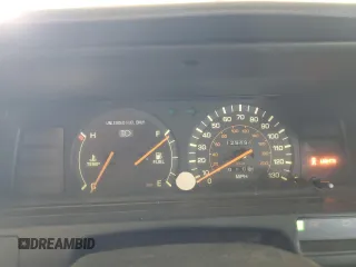 1991 Toyota Camry DLX z VIN 4T1SV21E1MU450315, wystawiony jako Copart lot #42772935 z przebiegiem 125 494 mil mil oraz Szkoda całkowita • Salvage title. Historia ofert i sprzedaży dostępna na DreamBid. Obrazek 9.