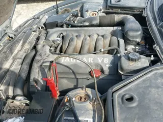 2001 Jaguar XK с VIN SAJDA42CX1NA13828, выставлен на аукционе IAAI как лот 41600573 с пробегом 142 303 миль миль и . История ставок и продаж доступна на DreamBid. Изображение 13.