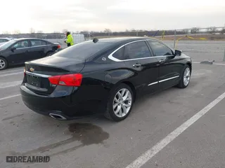 2014 Chevrolet Impala LTZ with VIN 2G1155S31E9211885, listed as a IAAI auction lot 41804249 with 149,066 mi miles. Bid and sale history available at carsss.com. Image 4.