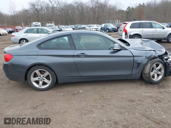 2014 BMW 4 Series 428i xDrive with VIN WBA3N9C50EK246002, listed as a IAAI auction lot 41612256 with 100,915 mi miles and . Bid and sale history available at carsss.com. Image 13.
