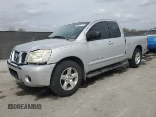 2006 Nissan Titan SE with VIN 1N6BA06A16N571799, listed as a Copart auction lot 46093745 with 118,019 mi miles and Salvage Title. Bid and sale history available at DreamBid. Image 1.