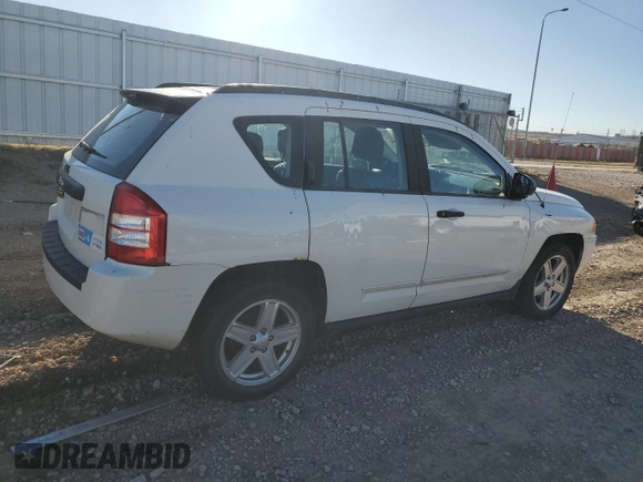 2010 Jeep Compass Sport with VIN 1J4NF4FB7AD503727, listed as a Copart auction lot 81966154 with 134,696 mi miles and Clean Title. Bid and sale history available at carsss.com. Image 3.