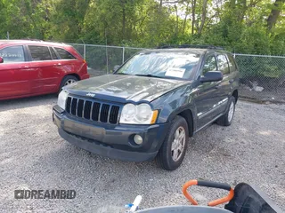 2007 Jeep Grand Cherokee Laredo z VIN 1J8HR48P57C590313, wystawiony jako IAAI lot #42306996 z przebiegiem 181 737 mil mil oraz . Historia ofert i sprzedaży dostępna na DreamBid. Obrazek 2.