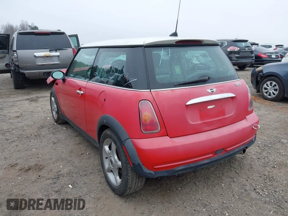 2005 MINI Hardtop with VIN WMWRC33485TJ67837, listed as a IAAI auction lot 41806208 with 140,646 mi miles and . Bid and sale history available at DreamBid. Image 3.