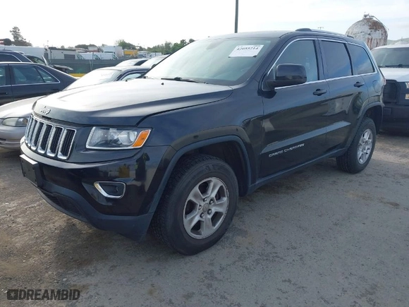 2014 Jeep Grand Cherokee Laredo with VIN 1C4RJFAG9EC516138, listed as a IAAI auction lot 42055214 with 135,701 mi miles. Bid and sale history available at carsss.com. Image 2.