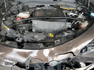 2018 Alfa Romeo Stelvio Ti z VIN ZASFAKBN4J7C22701, wystawiony jako Copart lot #48041535 z przebiegiem 137 764 mil mil oraz Szkoda całkowita • Salvage title. Historia ofert i sprzedaży dostępna na DreamBid. Obrazek 12.