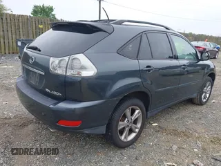 2006 Lexus RX 400h with VIN JTJHW31U460043430, listed as a IAAI auction lot 42622044 with 297,820 mi miles and . Bid and sale history available at DreamBid. Image 4.