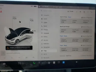 2023 Tesla Model 3 with VIN 5YJ3E1EA8PF449797, listed as a Copart auction lot 64601115 with 99,771 mi miles and Clean title. Bid and sale history available at DreamBid. Image 9.