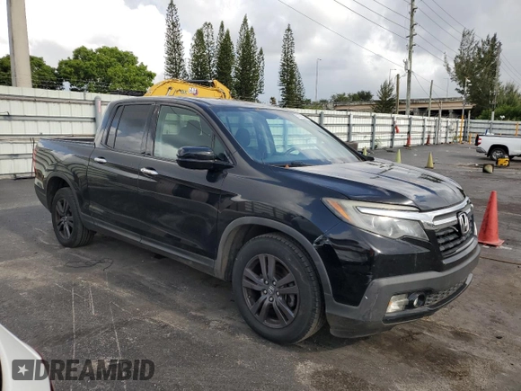 2019 Honda Ridgeline Sport with VIN 5FPYK2F15KB003142, listed as a Copart auction lot 57058235 with 173,049 mi miles and Clean title. Bid and sale history available at DreamBid. Image 4.