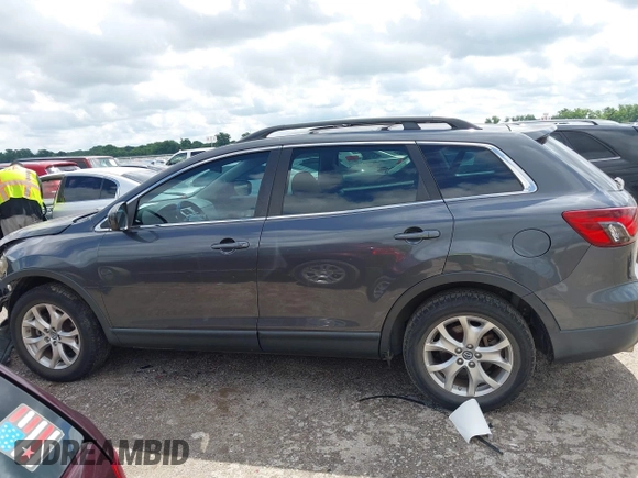 2015 Mazda CX-9 Touring with VIN JM3TB2CA7F0460232, listed as a IAAI auction lot 42344122 with 103,478 mi miles and . Bid and sale history available at DreamBid. Image 15.