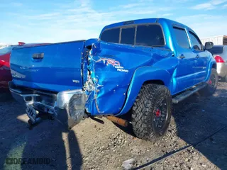 2011 Toyota Tacoma with VIN 5TFLU4EN1BX004646, listed as a IAAI auction lot 41433676 with 185,135 mi miles. Bid and sale history available at carsss.com. Image 4.