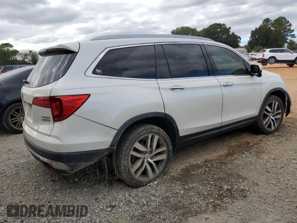 2017 Honda Pilot Touring z VIN 5FNYF6H92HB067140, wystawiony jako Copart lot #72200584 z przebiegiem 127 856 mil mil oraz Szkoda całkowita • Salvage title. Historia ofert i sprzedaży dostępna na DreamBid. Obrazek 3.