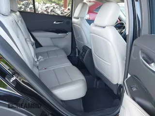 2020 Cadillac XT4 FWD Premium Luxury with VIN 1GYFZCR42LF144359, listed as a IAAI auction lot 42012677 with 34,490 mi miles and . Bid and sale history available at carsss.com. Image 8.