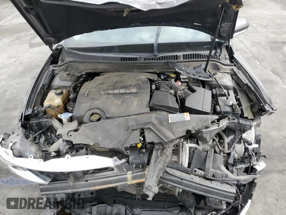 2016 Lincoln MKZ with VIN 3LN6L2GK8GR633923, listed as a Copart auction lot 58014495 with 119,579 mi miles and Salvage title. Bid and sale history available at DreamBid. Image 11.