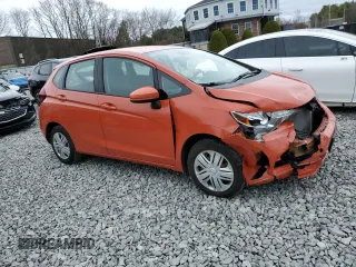 2018 Honda Fit LX with VIN 3HGGK5H43JM700138, listed as a Copart auction lot 52957555 with 55,309 mi miles and Salvage Title. Bid and sale history available at carsss.com. Image 4.
