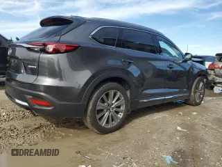 2023 Mazda CX-9 Signature with VIN JM3TCBEYXP0632844, listed as a Copart auction lot 87180834 with 20,415 mi miles and Salvage title. Bid and sale history available at DreamBid. Image 3.
