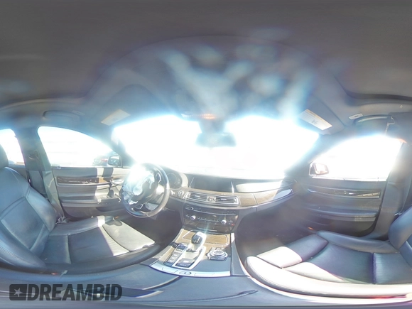 2013 BMW 7 Series 750Li xDrive с VIN WBAYF8C5XDD141001, выставлен на аукционе Copart как лот 48727635 с пробегом 131 462 миль миль и Списание • Salvage title. История ставок и продаж доступна на DreamBid. Изображение 13.
