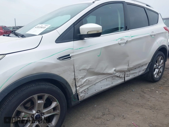 2016 Ford Escape Titanium with VIN 1FMCU9JX6GUB50226, listed as a IAAI auction lot 42033033 with 108,782 mi miles and . Bid and sale history available at DreamBid. Image 6.