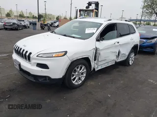 2015 Jeep Cherokee Latitude with VIN 1C4PJLCB0FW761871, listed as a IAAI auction lot 42099336 with 213,049 mi miles and . Bid and sale history available at DreamBid. Image 19.