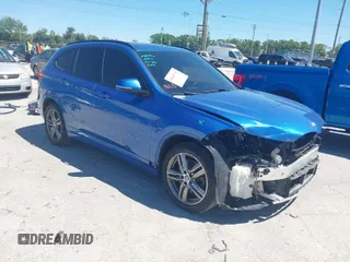 2017 BMW X1 sDrive28i with VIN WBXHU7C31H5H33281, listed as a IAAI auction lot 41814792 with 55,756 mi miles. Bid and sale history available at carsss.com. Image 1.