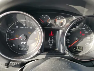 2014 Audi TT Premium Plus z VIN TRUSFAFKXE1004232, wystawiony jako Copart lot #58706175 z przebiegiem 113 835 mil mil oraz Szkody całkowita. Historia ofert i sprzedaży dostępna na DreamBid. Obrazek 9.