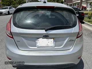 2015 Ford Fiesta SE z VIN 3FADP4EJ8FM167515, wystawiony jako IAAI lot #42153873 z przebiegiem 100 559 mil mil oraz . Historia ofert i sprzedaży dostępna na DreamBid. Obrazek 12.